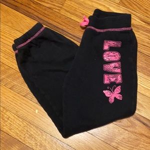 Black sweats w/ pink detailing